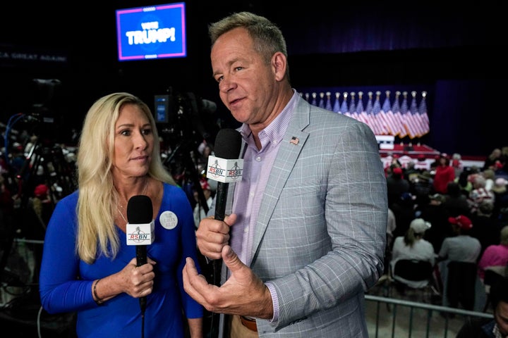 Brian Glenn (right) announced his departure from Real America's Voice on Thursday, just one week after the president made a snide comment about his fiancée, former Rep. Marjorie Taylor Greene (left).