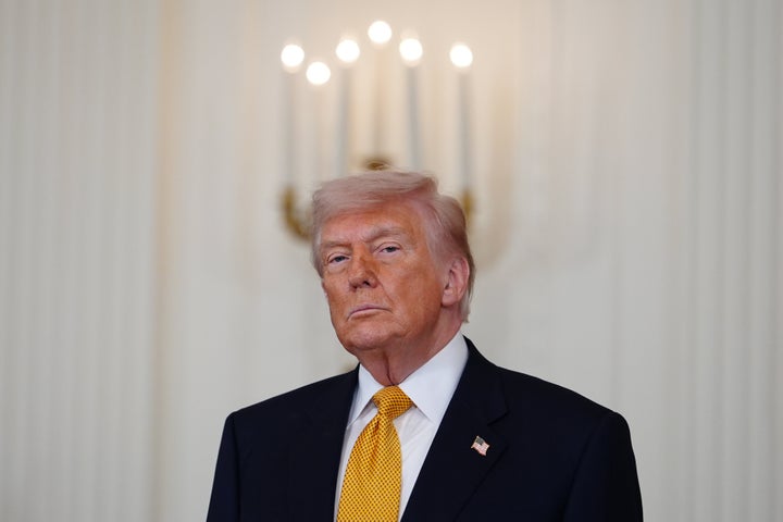 President Donald Trump, with first lady Melania Trump, not shown, attends an event for military mothers in the East Room of the White House, Wednesday, May 6, 2026, in Washington. (AP Photo/Julia Demaree Nikhinson)
