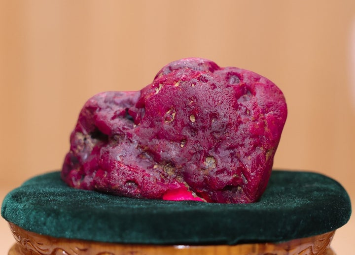 In this photo provided by Myanmar Military True News Information Team on Thursday, May 7, 2026, Myanmar's newly discovered ruby is displayed at president office in Naypyitaw, Myanmar. (Myanmar Military True News Information Team via AP Photo)