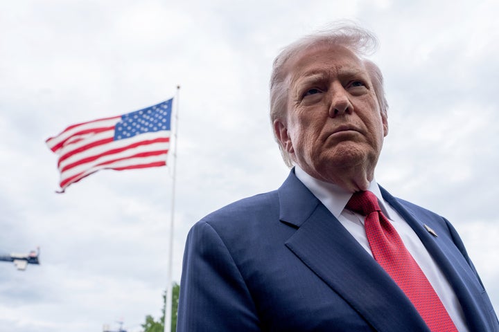 President Donald Trump speaks to members of the media on the South Lawn of the White House before boarding Marine One in Washington, DC, US, on Friday, May 8, 2026.(Aaron Schwartz/CNP/Bloomberg via Getty Images)