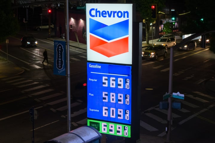 A sign for fuel prices is displayed at a gas station in Portland, Ore., on May 6, 2026.