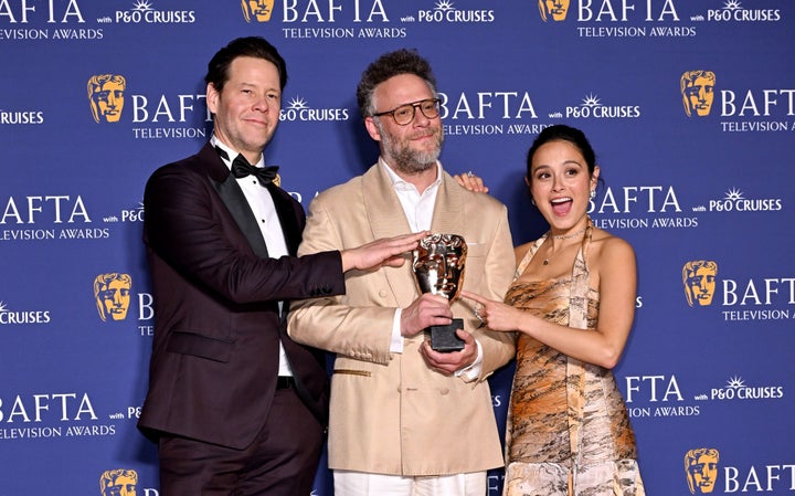 Ike Barinholtz, Seth Rogen and Chase Sui Wonders celebrate The Studio's win at the TV Baftas
