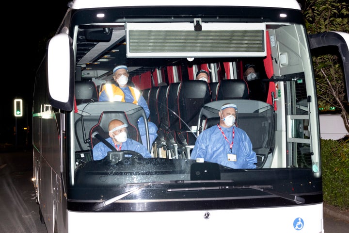 The bus carrying the British passengers and crew being repatriated from the MV Hondius makes it's way to Arrowe Park Hospital on May 10, 2026 in Birkenhead, England. Twenty-two British passengers and crew from the MV Hondius, who have tested negative for Hantavirus, have been repatriated via charter flight from Tenerife and taken to Arrowe Park Hospital in Wirral for clinical assessment. They will undergo an initial 72-hour testing period in a dedicated accommodation block to determine if they can complete a mandatory 45-day isolation at home.