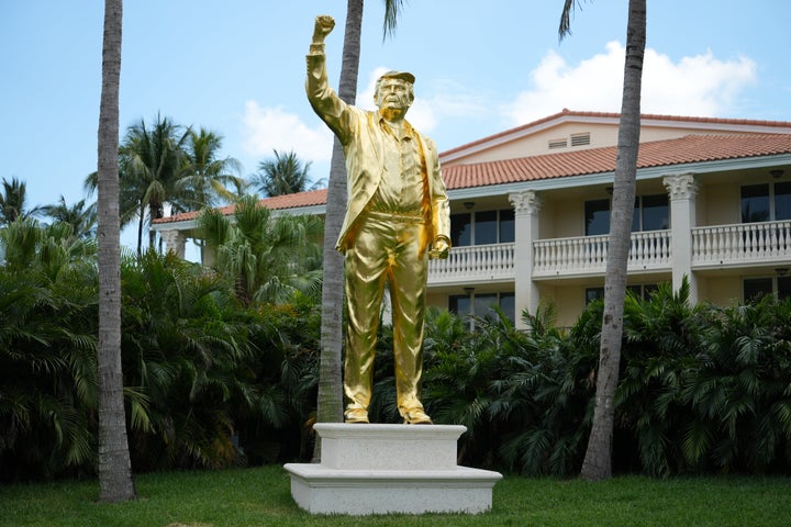 A golden Donald Trump statue is seen during the first round of the Cadillac Championship at Trump National Doral in Miami.