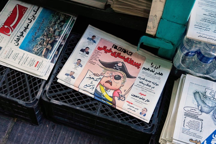  "Open the the Strait of Hormuz" on a news stand in northern Tehran, Iran, Sunday, May 10, 2026. (AP Photo/Vahid Salemi)