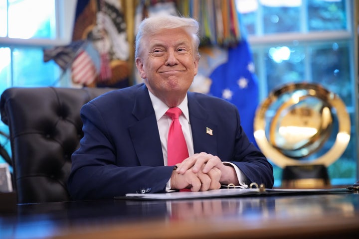 President Donald Trump looking very pleased with himself in the Oval Office on Aug. 14, 2025, in Washington, D.C.
