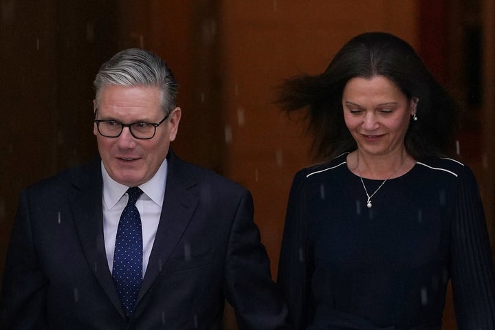 Britain's Prime Minister Keir Starmer and wife Victoria leave 10 Downing Street to attend the State Opening of Parliament at the Houses of Parliament in London, Wednesday, May 13, 2026.