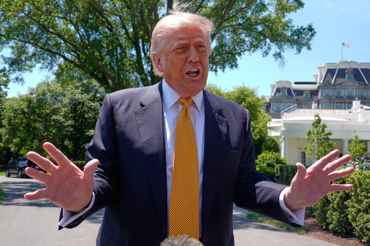 President Donald Trump speaks to reporters as he leaves the White House for travel to Beijing, Tuesday, May 12, 2026, in Washington, to meet with China's President Xi Jinping. (AP Photo/Manuel Balce Ceneta)