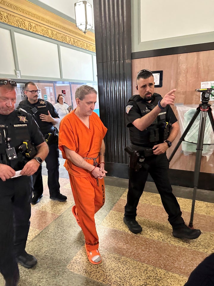 Oklahoma County Sheriff's deputies lead longtime death row inmate Richard Glossip to a courtroom on Monday, June 9, 2025, at the Oklahoma County Courthouse in Oklahoma City. (AP Photo/Sean Murphy)