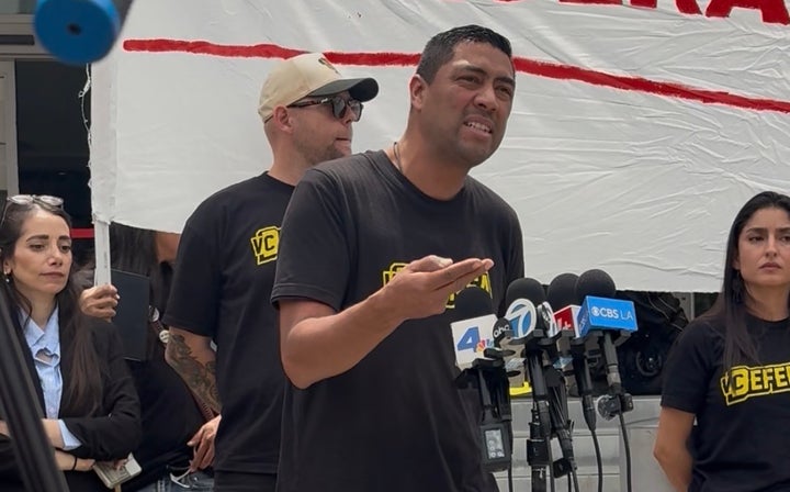 VC Defensa Leo Martinez speaking at a press conference in downtown Los Angeles after his home and business were raided by federal agents at 3 a.m.