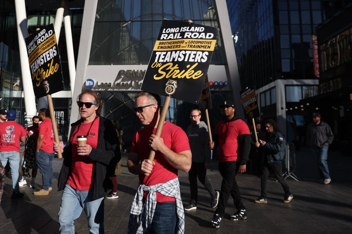 Long Island Rail Road workers stand on the picket line outside of Penn Station on the first day of their strike, Saturday, May 16, 2026, in New York. (AP Photo/Heather Khalifa)