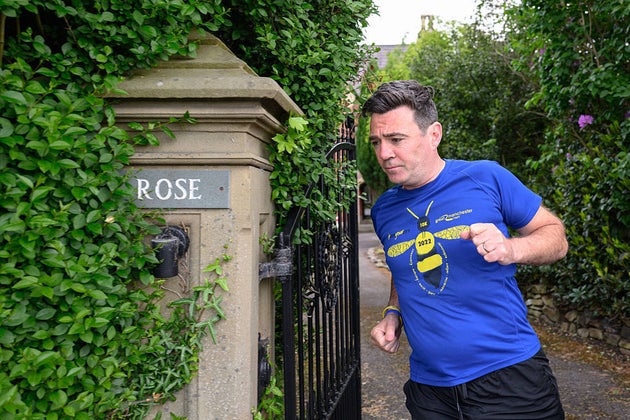 Andy Burnham goes for his morning run on May 16.