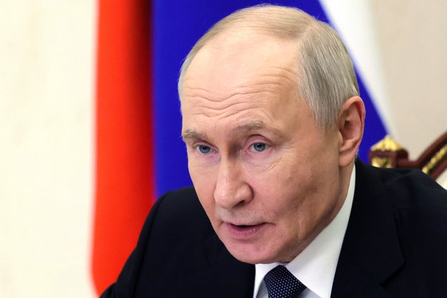 Russian President Vladimir Putin chairs a Security Council meeting via videoconference at the Kremlin in Moscow, Monday, May 18, 2026.