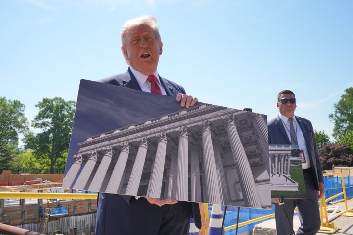President Donald Trump tours Ballroom construction around the outside the White House on Tuesday. (AP Photo/Jacquelyn Martin)