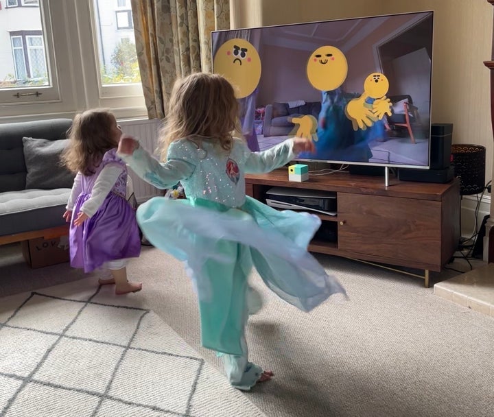 Kids using the emoji feature on Mirrorama – they created their own game of trying to steal the 'smiley' face from each other.