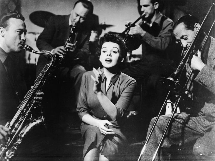 Long before Barbra Streisand and Lady Gaga, Garland portrayed a rising Hollywood talent ensnared in a doomed romance in "A Star Is Born." 
