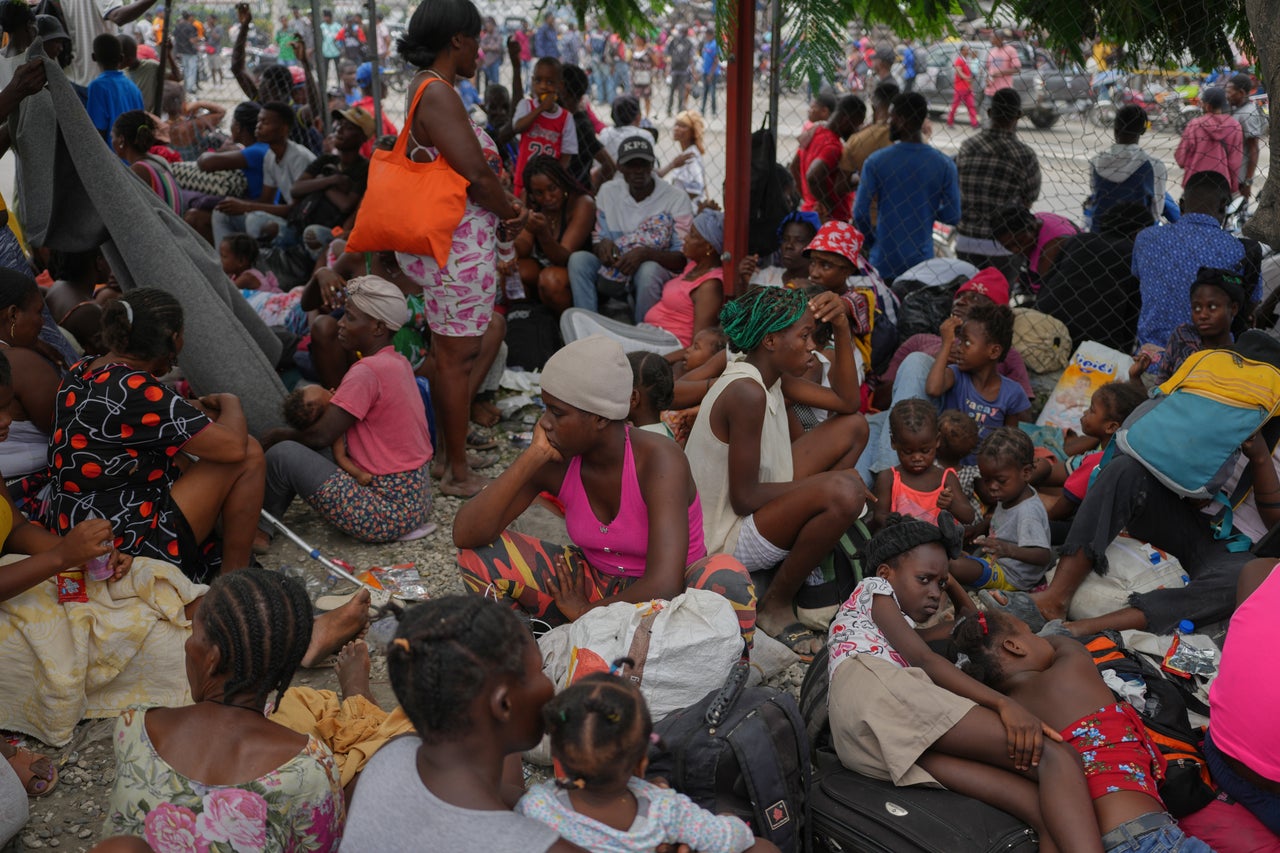Residents flee their homes to escape clashes between armed gangs in Port-au-Prince, Haiti, on May 11. Many TPS holders have children who are U.S. citizens. If their status is terminated and they are forced to return to Haiti or elsewhere, they will have to decide whether to take their children with them into potential unsafe situations or leave their children behind in the U.S.