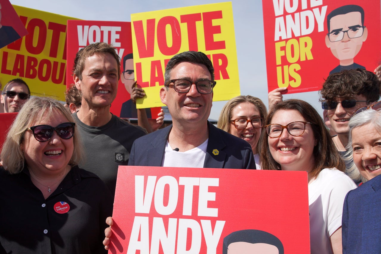 Andy Burnham stands with supporters during the launch of his campaign as Labour's candidate for the Makerfield by-election in Makerfield, England, Friday, May 22, 2026