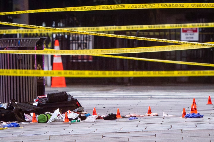 WASHINGTON, DC - MAY 23: Evidence markers are placed on the ground at the corner of Pennsylvania Avenue NW and 17th Street NW after multiple rapid-fire gunshots ring out outside the White House on May 23, 2026 in Washington, DC. President Trump was reportedly inside the White House working on a peace deal with Iran. (Photo by Al Drago/Getty Images)