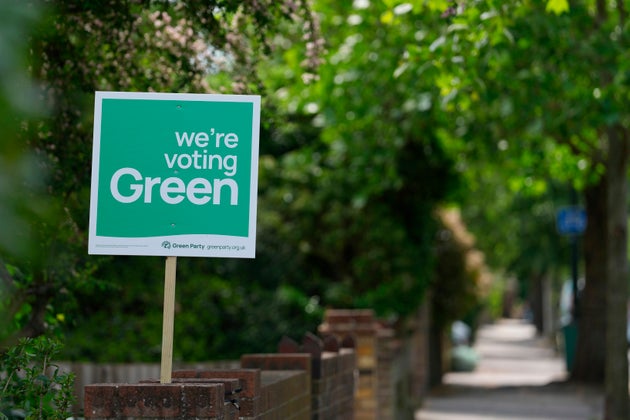 A Green Party political sign put up by the householder to show support ahead of local council elections in London, Wednesday, May 6, 2026. (AP Photo/Alastair Grant)