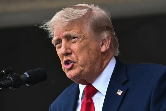 US President Donald Trump speaks during the National Memorial Day Observance at the Memorial Amphitheatre in Arlington National Cemetery in Arlington, Virginia on May 25, 2026. 