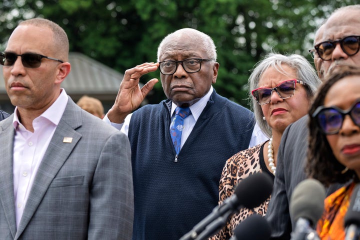 Rep. Jim Clyburn, D-S.C., center, joined by House Minority Leader Hakeem Jeffries, D-N.Y., left, stands with members of the Congressional Black Caucus during an event outside the Capitol in Washington, Tuesday, May 19, 2026. (AP Photo/J. Scott Applewhite)