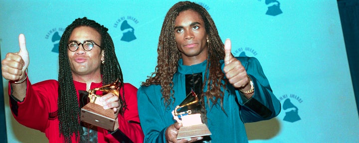 Milli Vanilli show off their Grammy Awards for Best New Artist in 1990.