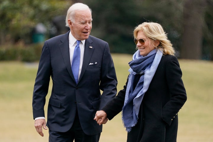 President Joe Biden and first lady Jill Biden arrive on the South Lawn of the White House on Jan. 23, 2023, in Washington.