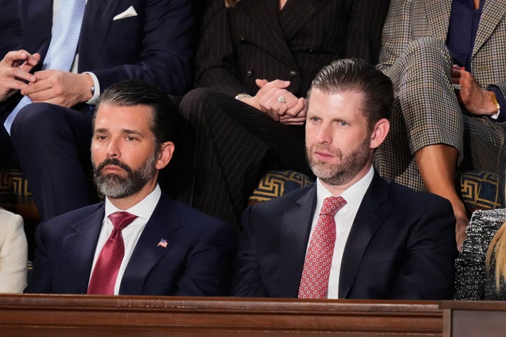 FILE - Donald Trump Jr. and Eric Trump listen to President Donald Trump's State of the Union address to a joint session of Congress in the House chamber at the U.S. Capitol in Washington, Tuesday, Feb. 24, 2026. (AP Photo/Alex Brandon, File)