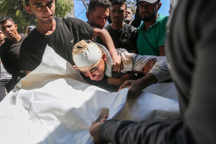 Loved ones gather at Al-Shifa Hospital to mourn the victim of an Israeli airstrike the previous night on May 28, 2026 in Gaza City. The strike on the Israa Tower also killed Izz al-Din Bik, commander of Hamas' northern Gaza brigade, and Imad Aslim, deputy commander of the Gaza City brigade and commander of the Zeitoun Battalion.