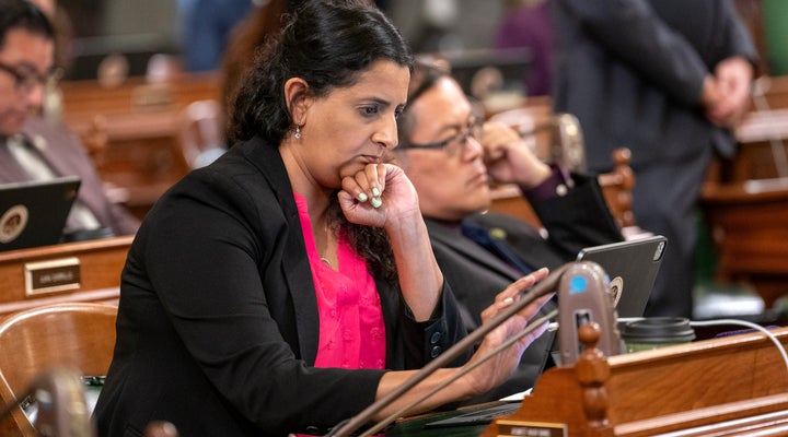 Assembly member Jasmeet Bain, D-Bakersfield, works at her desk at the Capitol in Sacramento, California, on Tuesday, Sept. 12, 2023.