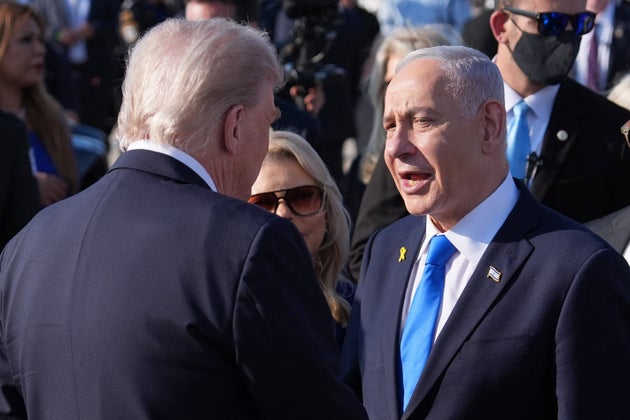 President Donald Trump talks with Israel's Prime Minister Benjamin Netanyahu and his wife Sara, before boarding Air Force One at Ben Gurion International Airport, Monday, Oct. 13, 2025, near Tel Aviv. 