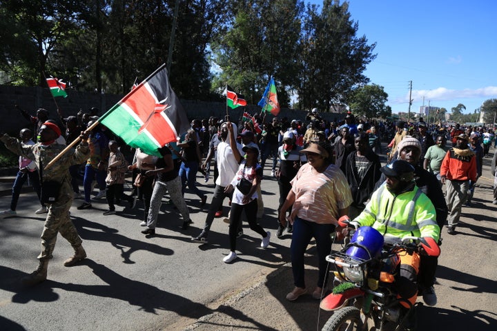 Protesters march toward the entrance of Laikipia Air Base and chant slogans during a demonstration against plans to establish an Ebola quarantine facility for U.S. citizens diagnosed with Ebola in Nanyuki, Kenya, on June 1, 2026.