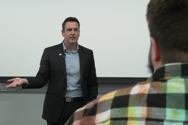 Zach Lahn, Republican candidate for Iowa governor, speaks to an environmental studies class at Drake University on Wednesday, May 6, 2026 in Des Moines, Iowa. (AP Photo/Brittany Peterson)