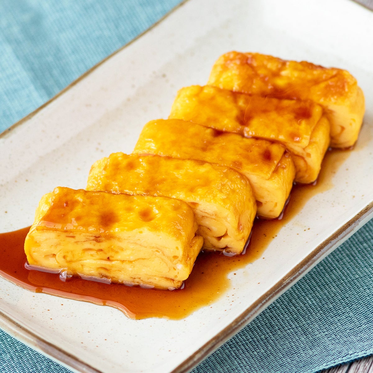 一度これを作ったらもう普通の卵焼きには戻れない！照り焼きのたれを絡めたら毎週リクエストされるおかずになった