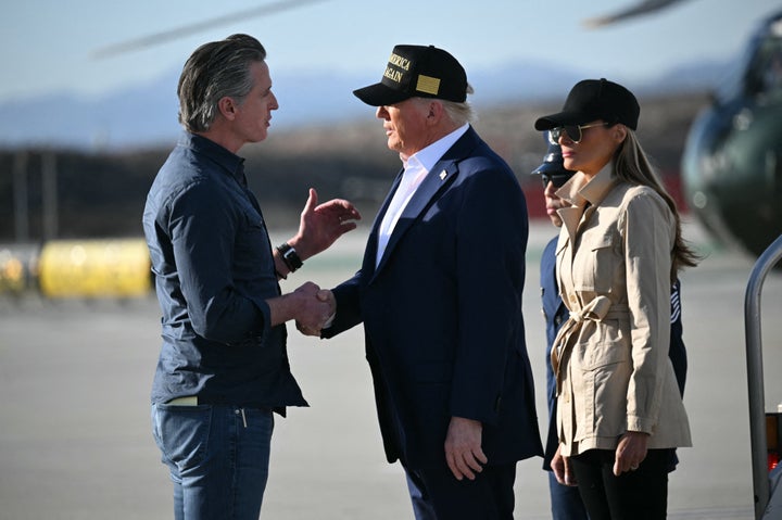California Gov. Gavin Newsom speaks with President Donald Trump at Los Angeles International Airport on January 24, 2025.