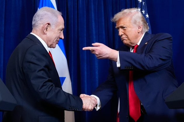 President Donald Trump shakes hands with Israel's Prime Minister Benjamin Netanyahu during a news conference at Mar-a-Lago, Monday, Dec. 29, 2025, in Palm Beach, Fla. (AP Photo/Alex Brandon)