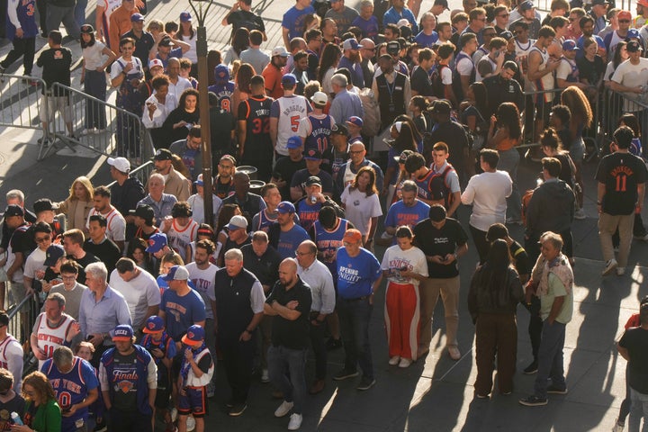 Fans gather outside Madison Square Garden prior to Game 3 of the NBA Finals basketball series between the San Antonio Spurs and the New York Knicks, Monday, June 8, 2026, in New York. (AP Photo/Ross D. Franklin)