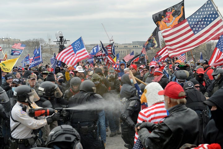 Talk of an “enemy within” has increased in recent years in the U.S. Trump supporters clash with police and security forces as people try to storm the U.S. Capitol in Washington on Jan. 6, 2021.