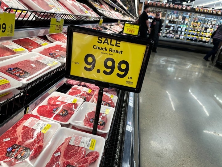 A sale sign stands in the case containing cuts of chuck roast in a King Soopers grocery store Friday, March 13, 2026, in southeast Denver. (AP Photo/David Zalubowski)