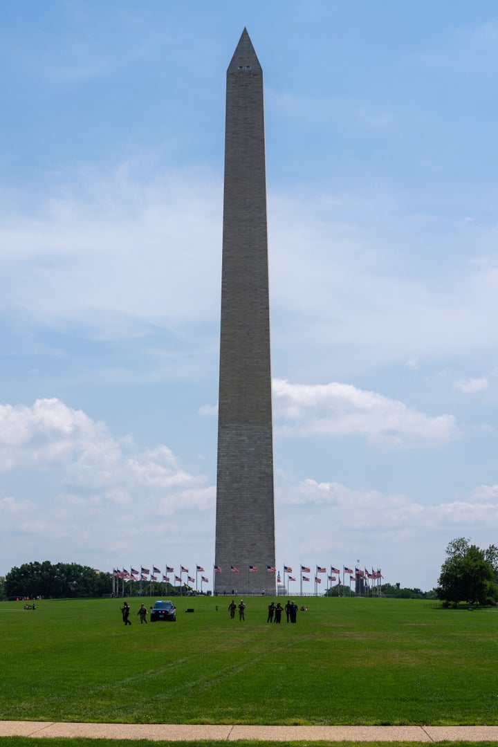 June 11, 2026, Washington, DC, United States: US Park Police, National Guard, and local firemen investigate a vandalism at the Washington Monument where the numbers 8647 were marked in the grass. (Credit Image: Andrew Leyden/ZUMA Press Wire)