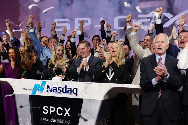 Bret Johnsen, chief financial officer of Space Exploration Technologies Corp. (SpaceX), center, and Gwynne Shotwell, president of Space Exploration Technologies Corp. (SpaceX), center right, during the company's initial public offering (IPO) at the Nasdaq MarketSite in New York, US, on Friday, June 12, 2026. SpaceX has made history with the biggest-ever IPO, launching it into the top ranks of the largest public companies and putting founder Elon Musk on the verge of becoming the world's first trillionaire. Photographer: Michael Nagle/Bloomberg via Getty Images