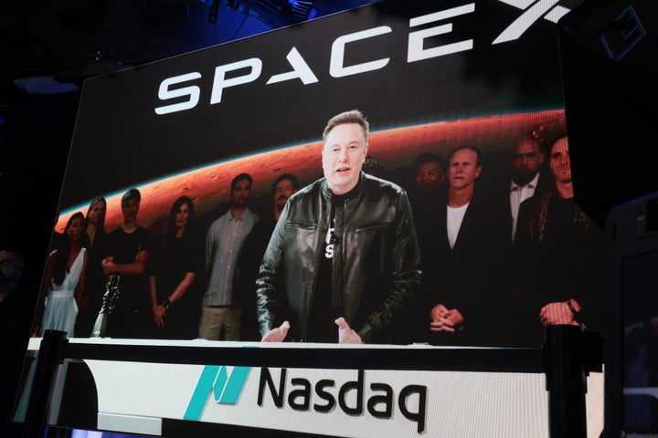 NEW YORK, NEW YORK - JUNE 12: Elon Musk, founder and CEO of SpaceX, speaks via video before the ringing of opening bell at the Nasdaq Marketsite at the launch of the company's initial public offering (IPO) on June 12, 2026 in New York City. (Photo by Spencer Platt/Getty Images)