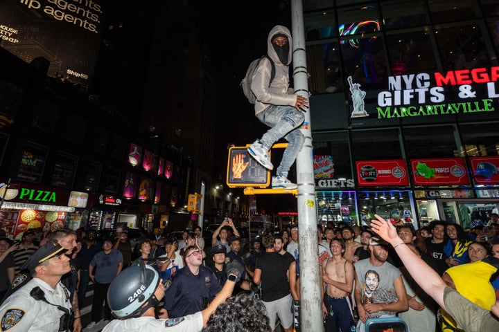 NEW YORK, NEW YORK - JUNE 11: New York Knicks fans celebrate after winning Game 4 of the NBA Finals between New York Knicks and San Antonio Spurs, on June 11, 2026 in New York City. Madison Square Garden canceled its planned Game 4 watch party outside the arena after New York Knicks owner Jim Dolan criticized Mayor Zohran Mamdani and NYPD Commissioner Jessica Tisch over security requirements for the event. (Photo by Adam Gray/Getty Images)