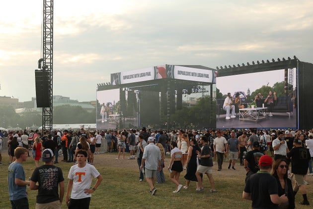 Fans attend the UFC Freedom 250 Fan Fest on The Ellipse ahead of the UFC Freedom 250 fight on the South Lawn of the White House on Sunday.