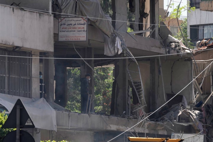 A man checks an apartment that was hit in an Israeli airstrike in Dahiyeh, Beirut's southern suburbs, Lebanon, on June 14, 2026. 