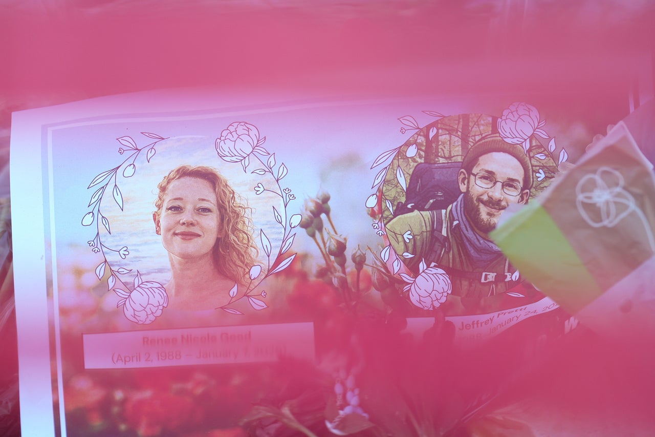 Images of Renee Good, left, and Alex Pretti, who were both shot and killed by federal immigration officers, are seen at a makeshift memorial at the site where Pretti was killed, in Minneapolis, Wednesday, Jan. 28, 2026.