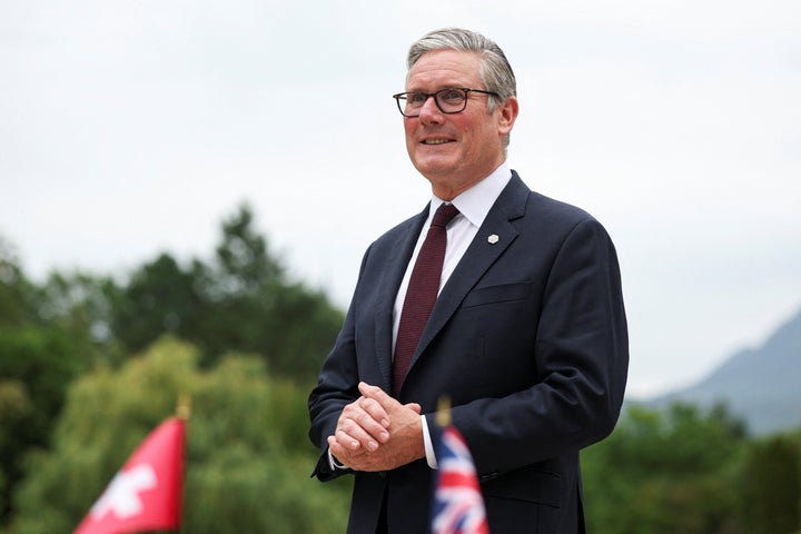 British Prime Minister Keir Starmer looks on as he awaits Switzerland's Federal President Guy Parmelin on the sidelines of the G7 summit, in Evian-les-Bains, France, Tuesday June 16, 2026. (Isabel Infantes/Pool Photo via AP)