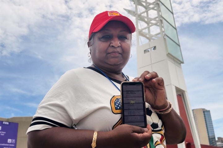 Bina Ramroop holds proof of the ticket she bought through StubHub for the World Cup Group H soccer match between Spain and Cape Verde in Atlanta on Monday.