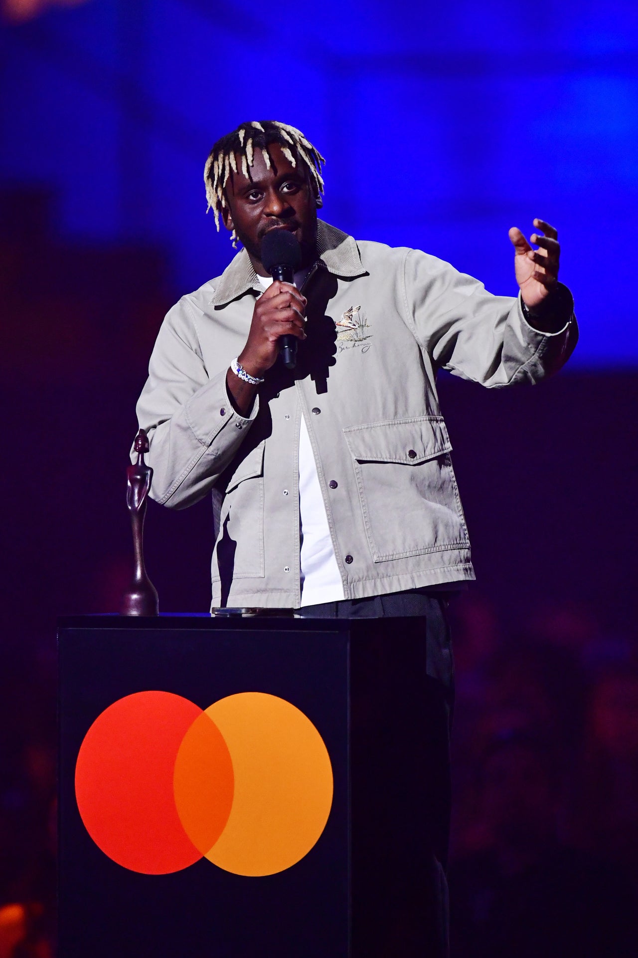 Myles Smith made a plea for change within the music industry while accepting his first Brit Award in March 2025